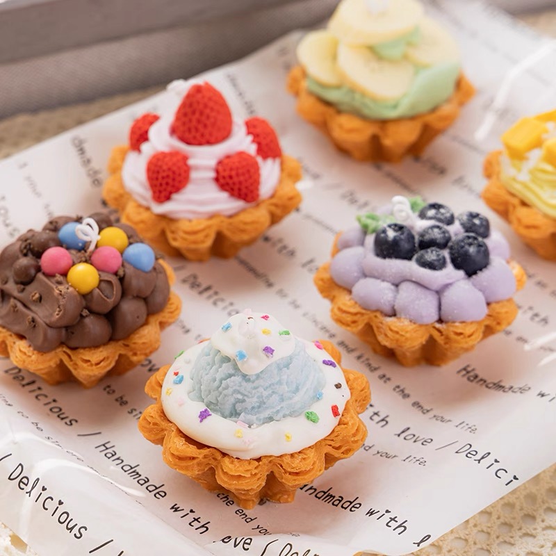 Strawberry egg tarts, scented candles, and fruit creative birthday gifts for girls. Handmade egg tarts and blueberry fruit candles details Picture