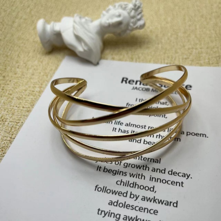Wholesale of European and American metal openings, personalized hollowed-out color-preserving gold-plated retro bracelets, fashionable and simple C-shaped cross-border bracelets details Picture