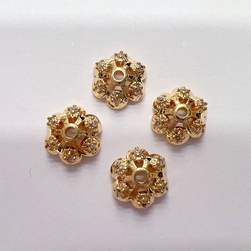 Jewelry accessories: Separators, flower caps, scattered beads, hand-strung beads, color-preserving copper plated with real gold, slightly inlaid zircon flower trays, snowflakes Specification image