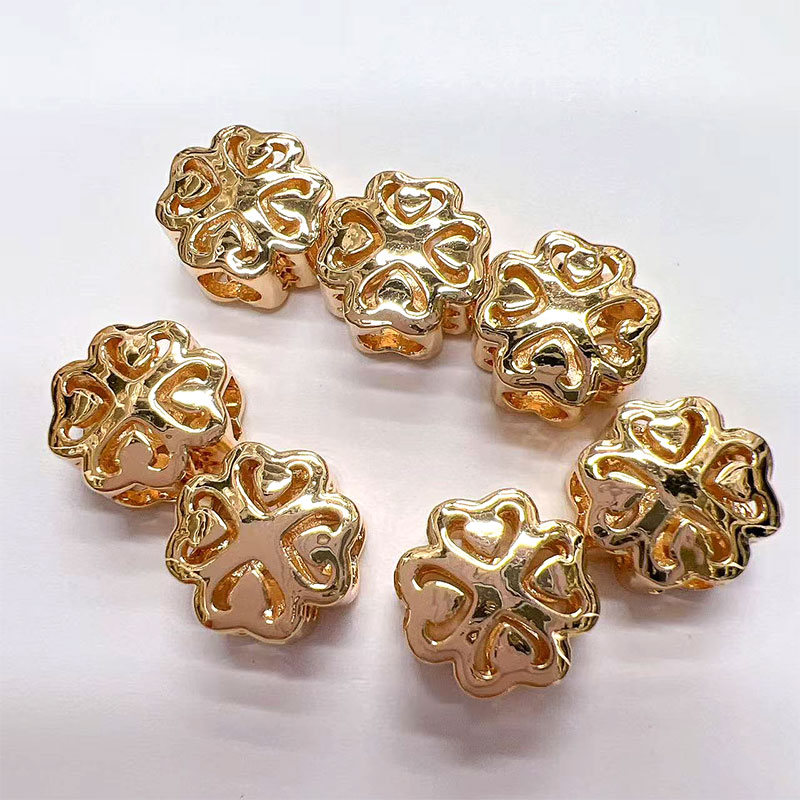 Copper plated with real gold, four-leaf flower, double-sided hollowed-out beads, DIY woven horizontal hole bracelet, necklace, loose beads and string beads accessories details Picture