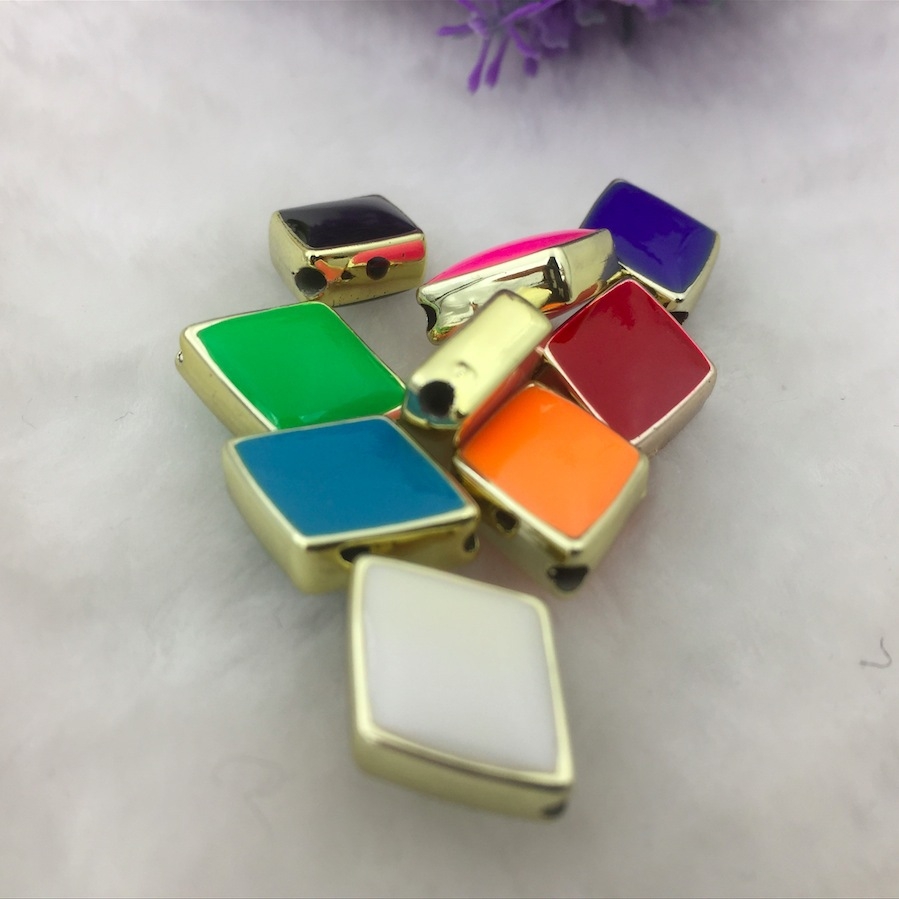 diy plastic jewelry bracelets and necklaces with golden double-sided oil-dripping diamond-shaped perforated beads are popular in Europe and America. Wholesale of 200 pieces per package diy plastic jewelry bracelets and necklaces with golden double-sided oil-dripping diamond-shaped perforated beads are popular in Europe and America. Wholesale of 200 pieces per package