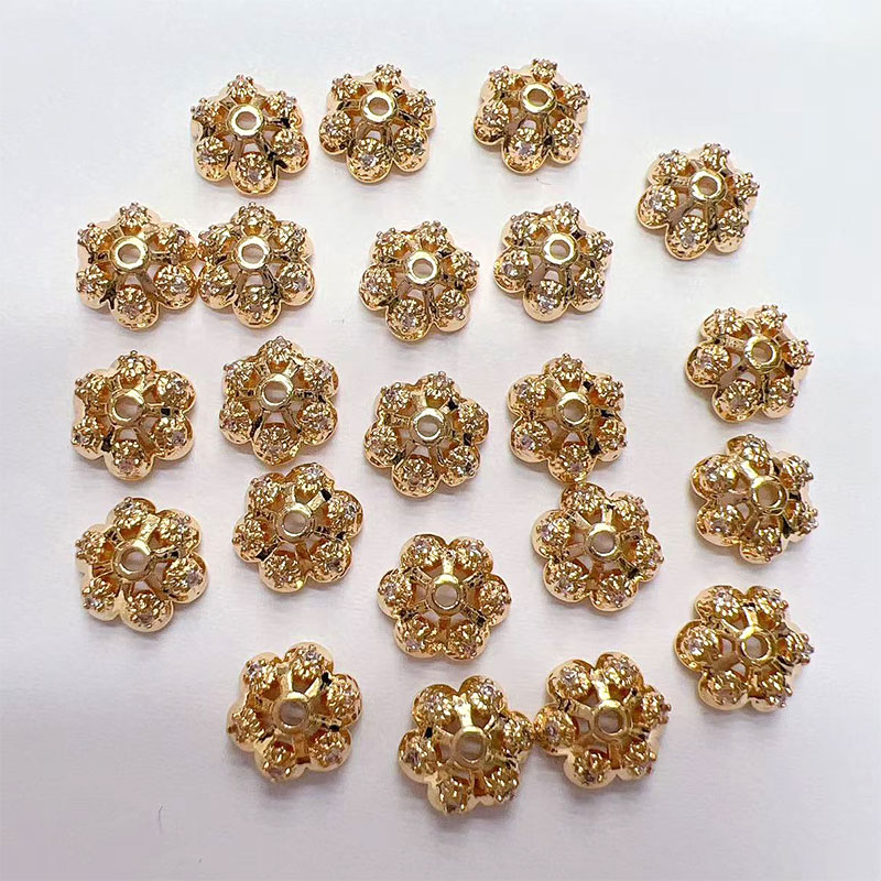 Jewelry accessories: Separators, flower caps, scattered beads, hand-strung beads, color-preserving copper plated with real gold, slightly inlaid zircon flower trays, snowflakes details Picture