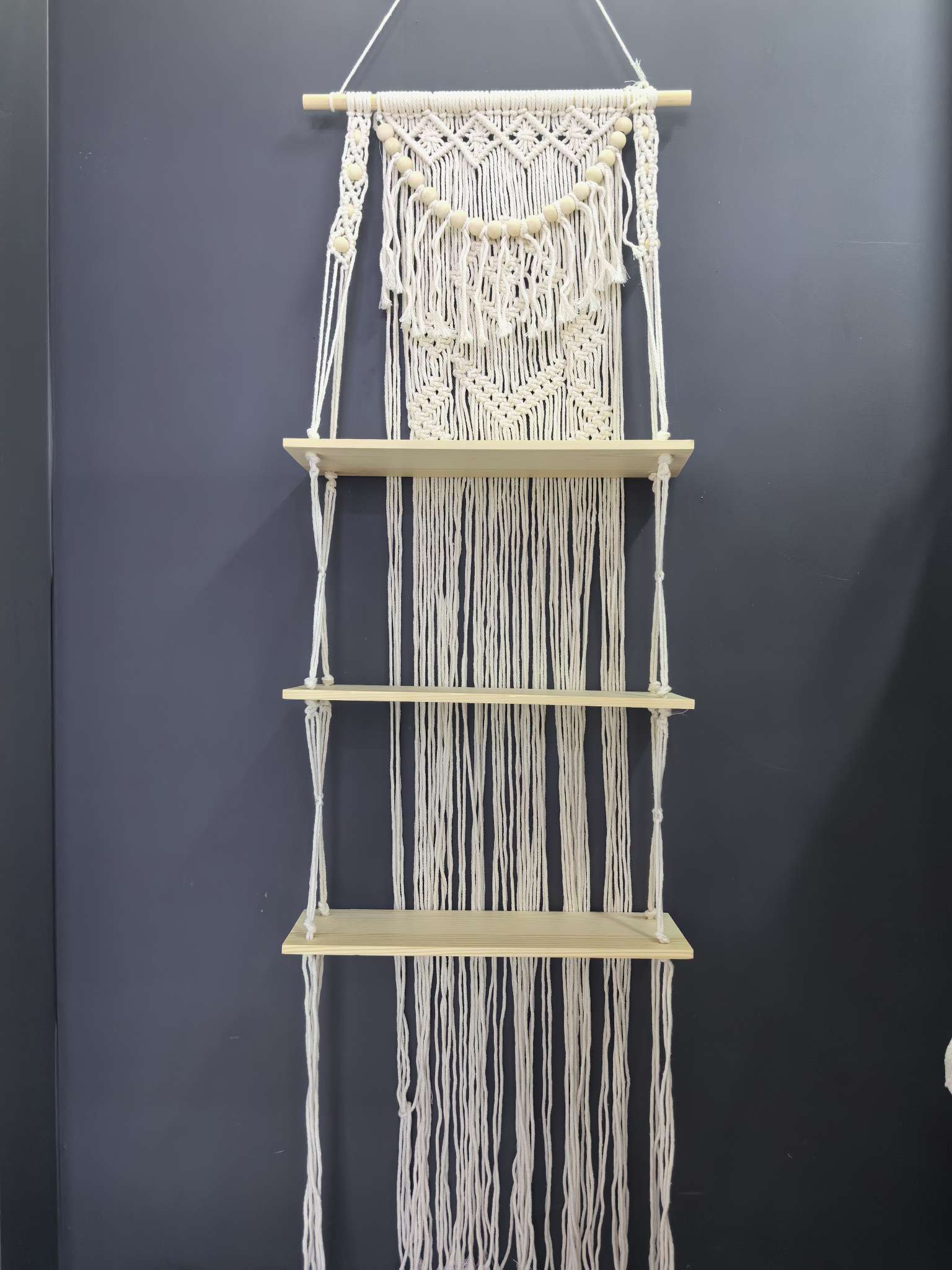 Cotton rope woven storage rack, hand-woven, can be used for decoration and storage. It is a popular storage rack for homestays, hotels and home furnishings. It is made of single-layer and double-layer raw wood and can hold plants. It can also bear weight detail image 17