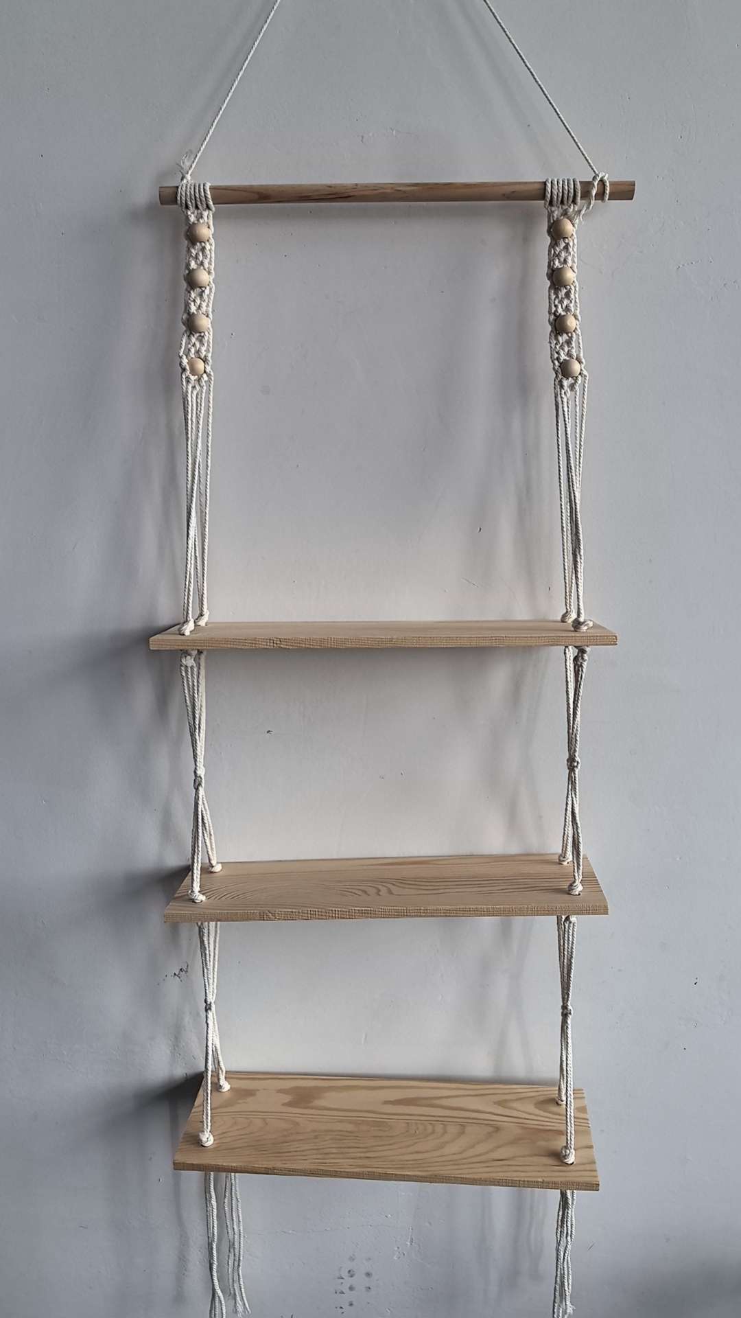 Cotton rope woven storage rack, hand-woven, can be used for decoration and storage. It is a popular storage rack for homestays, hotels and home furnishings. It is made of single-layer and double-layer raw wood and can hold plants. It can also bear weight detail image 4