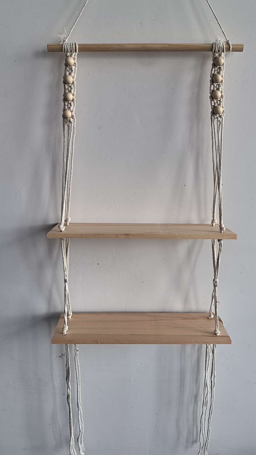 Cotton rope woven storage rack, hand-woven, can be used for decoration and storage. It is a popular storage rack for homestays, hotels and home furnishings. It is made of single-layer and double-layer raw wood and can hold plants. It can also bear weight detail image 7