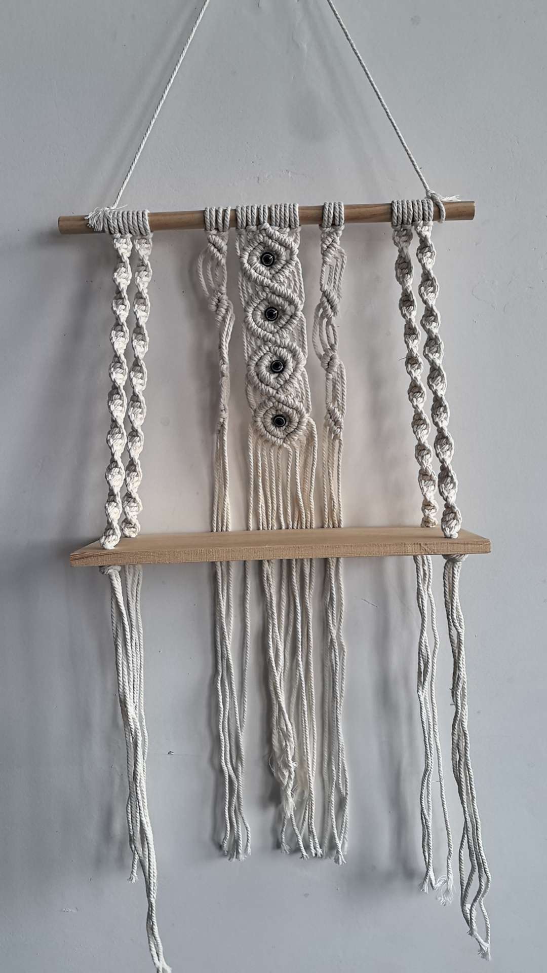 Cotton rope woven storage rack, hand-woven, can be used for decoration and storage. It is a popular storage rack for homestays, hotels and home furnishings. It is made of single-layer and double-layer raw wood and can hold plants. It can also bear weight detail image 6