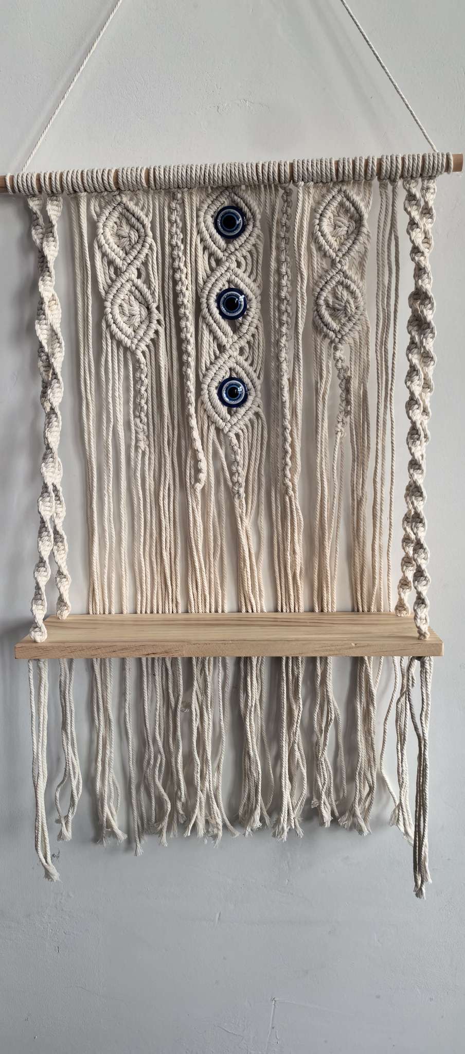 Cotton rope woven storage rack, hand-woven, can be used for decoration and storage. It is a popular storage rack for homestays, hotels and home furnishings. It is made of single-layer and double-layer raw wood and can hold plants. It can also bear weight detail image 12