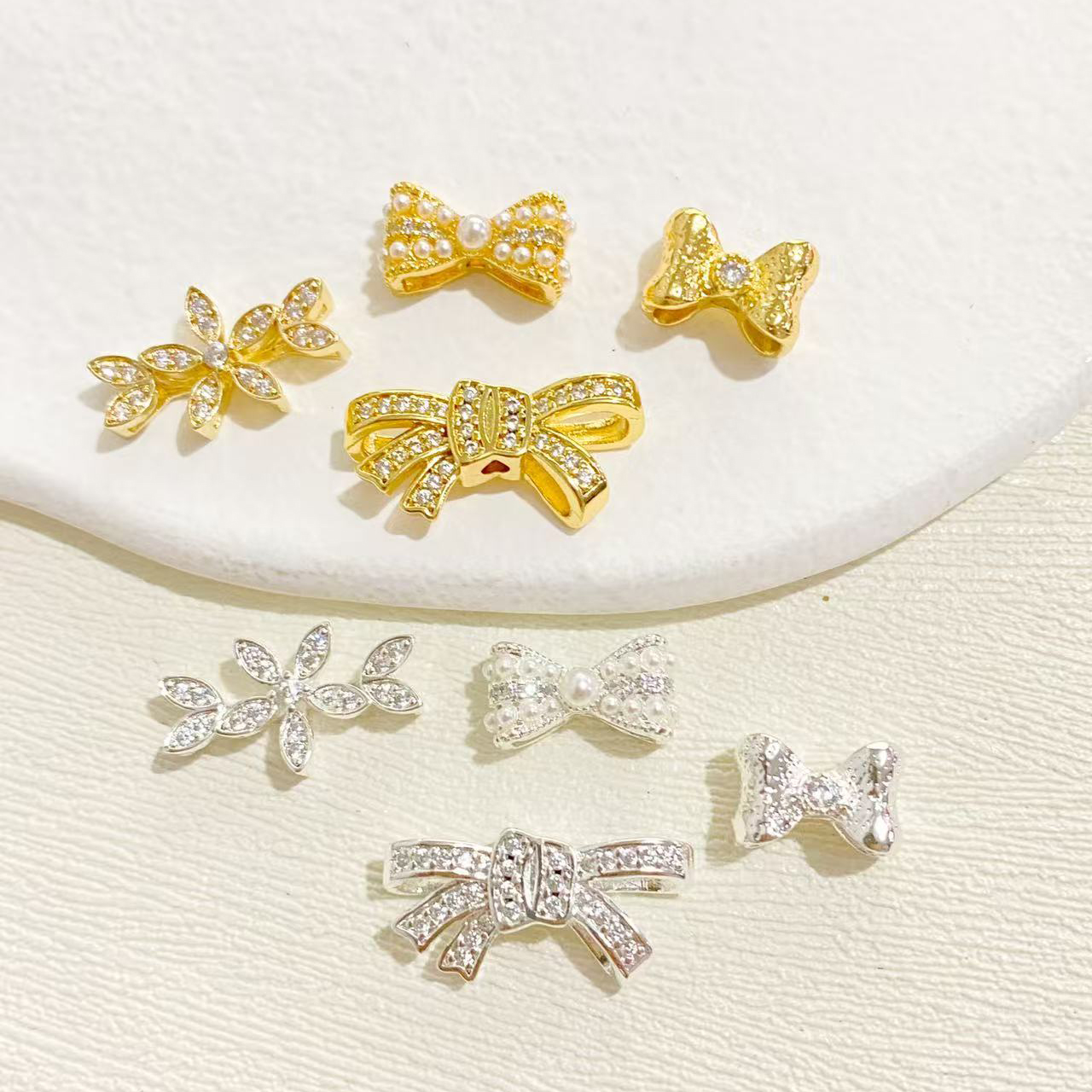 高保色滴油、水晶配件铜镀14K包金亮银色镶嵌锆石蝴蝶结手工diy手串项链串珍珠配饰散珠串珠隔珠材料木珠配件批发