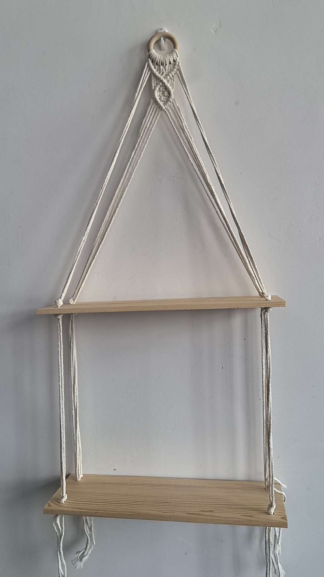 Cotton rope woven storage rack, hand-woven, can be used for decoration and storage. It is a popular storage rack for homestays, hotels and home furnishings. It is made of single-layer and double-layer raw wood and can hold plants. It can also bear weight detail image 9