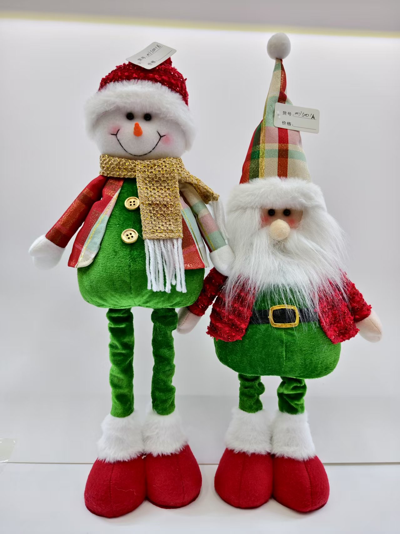A 50cm snowman in magenta and green for the Christmas festival decoration of a faceless and extendable old man Item Picture