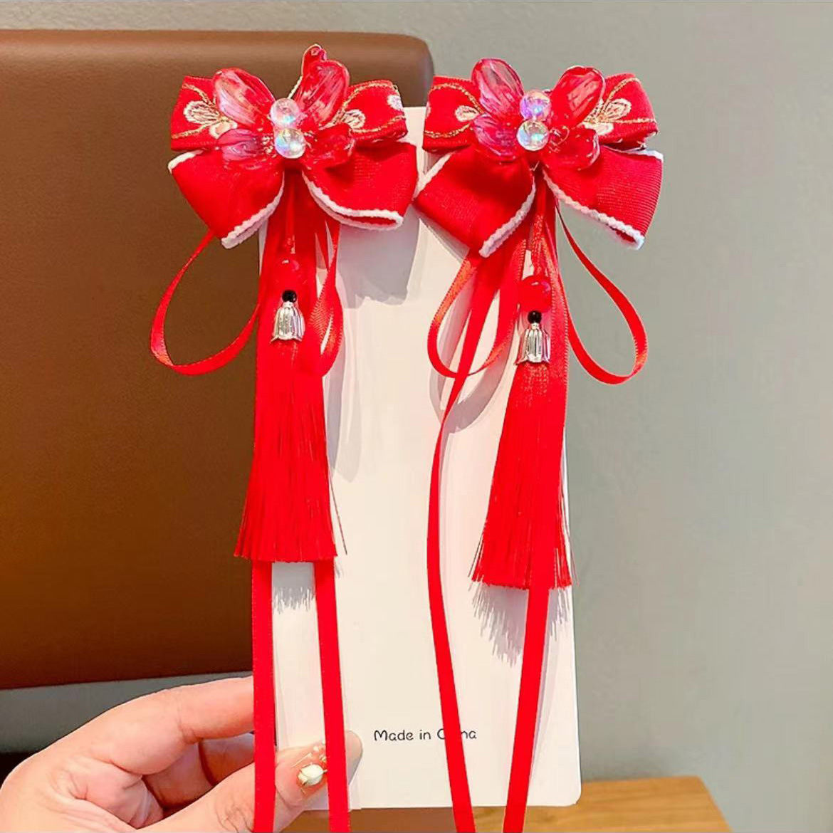 Cute girls' New Year red hair accessories with Chinese style, bow tassels, hair clips, hairpin clips, Spring Festival headwear