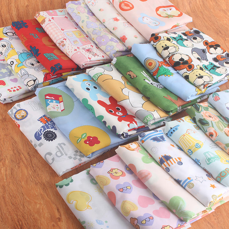 人造棉印花面料宝宝睡衣绵绸碎花连衣裙卡通床单棉绸府绸布料产品图