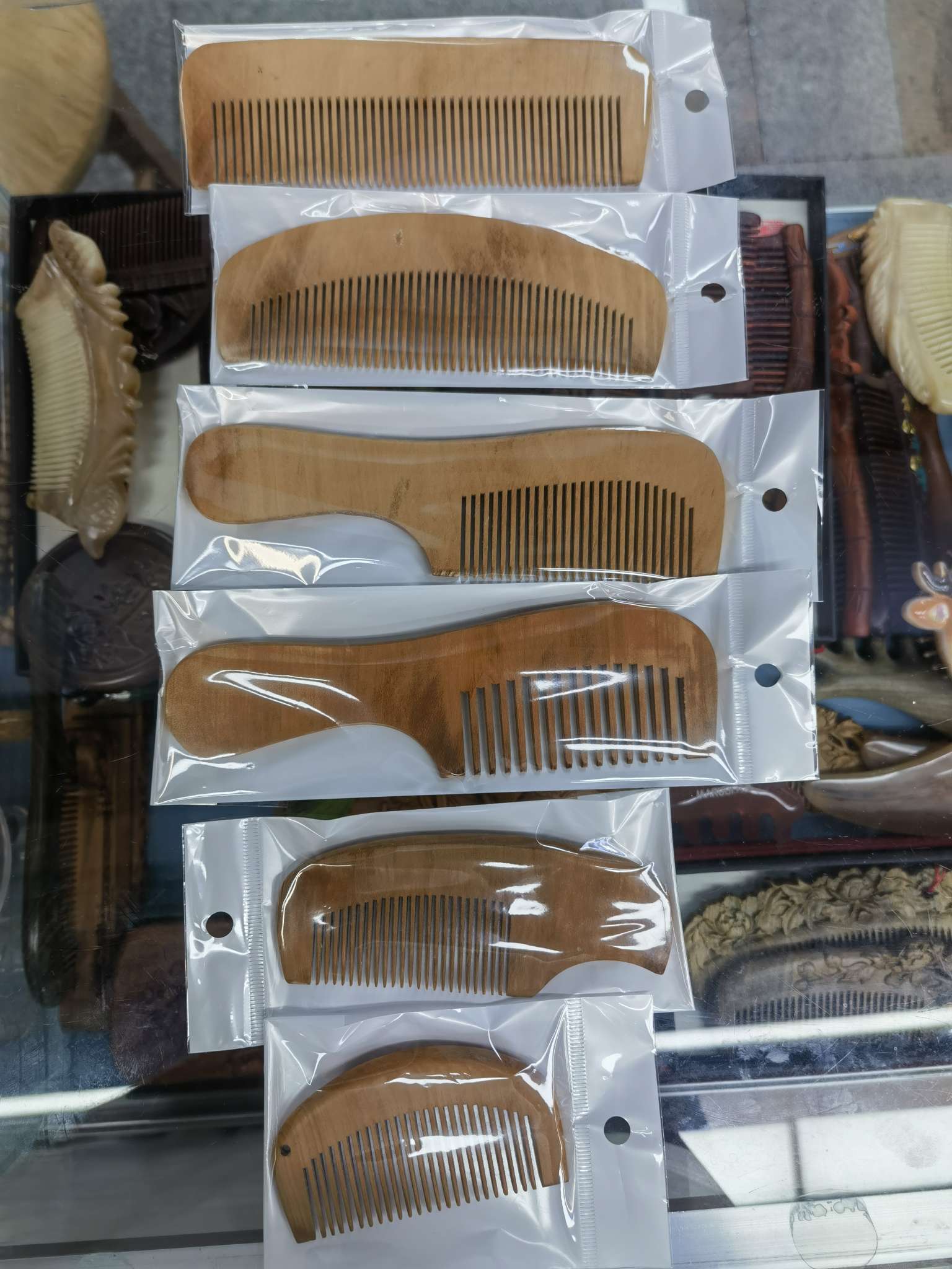 桃木梨木杏木梳便宜杂木梳9元店超市出口外贸热销可定制刻字刻花详情图2