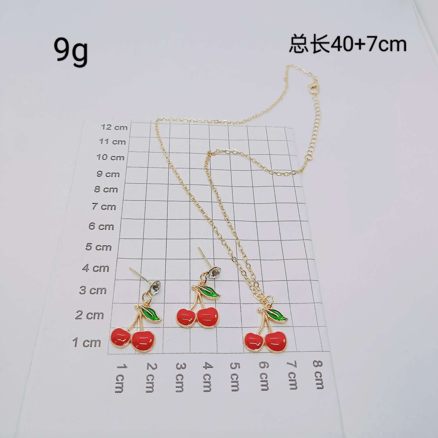 A set of fresh and sweet cherry earrings and necklaces from Amazon, a popular cross-border bestseller in Europe and America. The fruits are simple and fashionable, with oil drops and diamonds. Wholesale from the manufacturer detail image 4