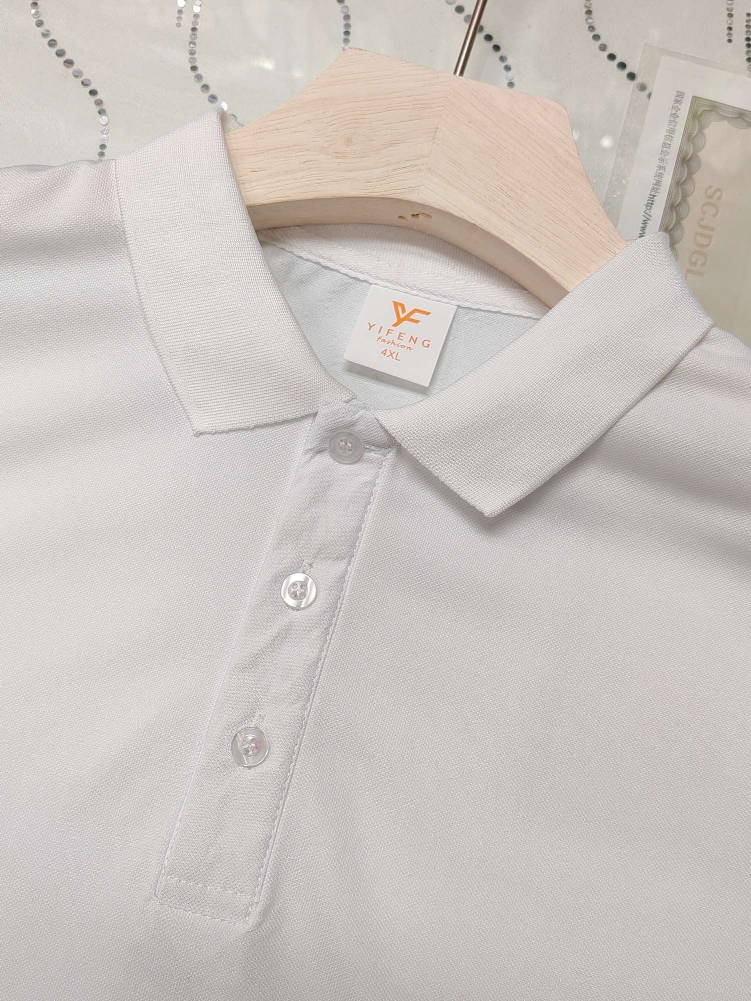 Cross-border ice silk elastic cool cotton imitation cotton new short-sleeved lapel polo for both men and women, fashionable and casual polo for both men and women, simple and comfortable short-sleeved trendy polo detail image 3