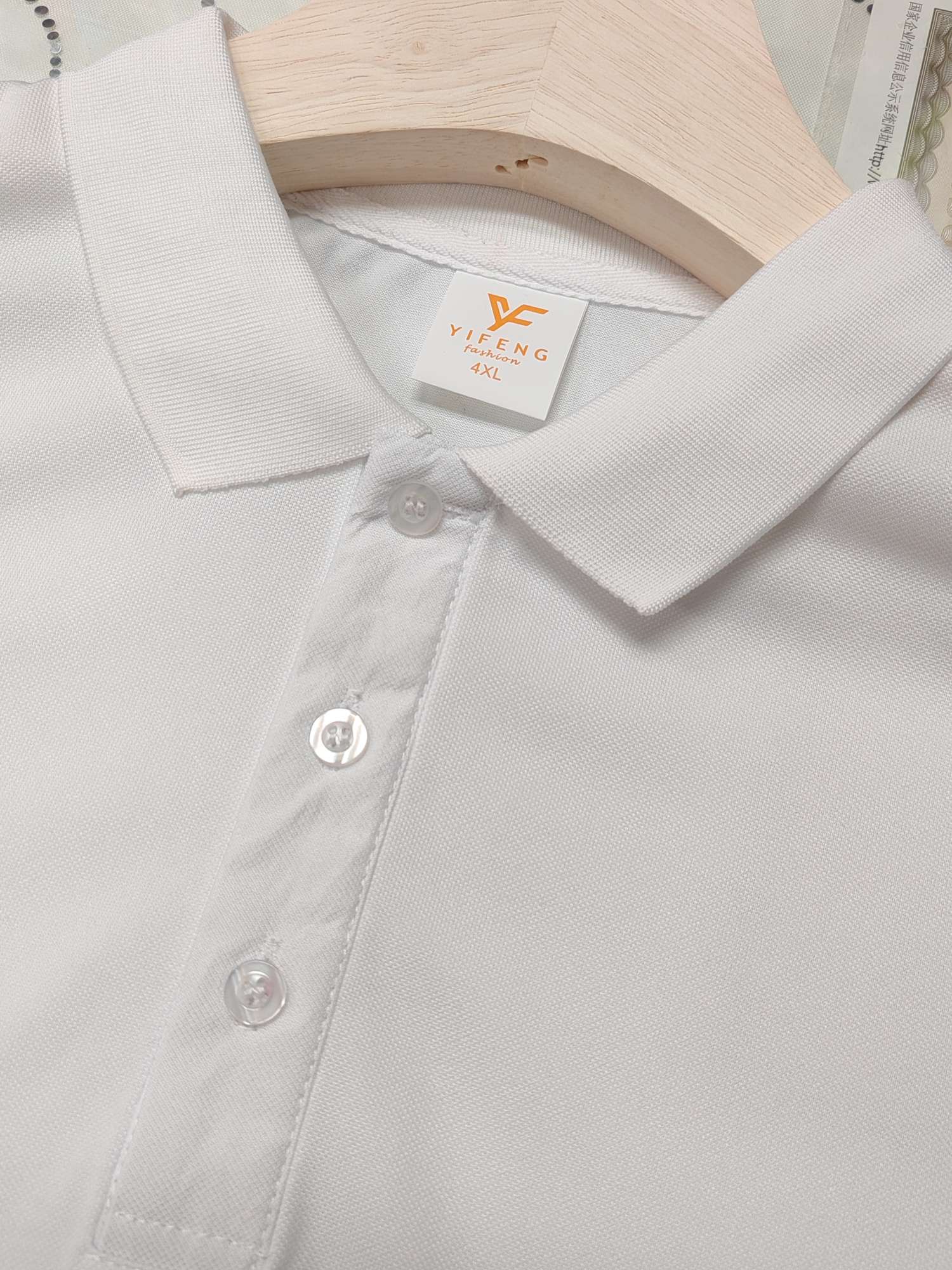 Cross-border ice silk elastic cool cotton imitation cotton new short-sleeved lapel polo for both men and women, fashionable and casual polo for both men and women, simple and comfortable short-sleeved trendy polo detail image 4