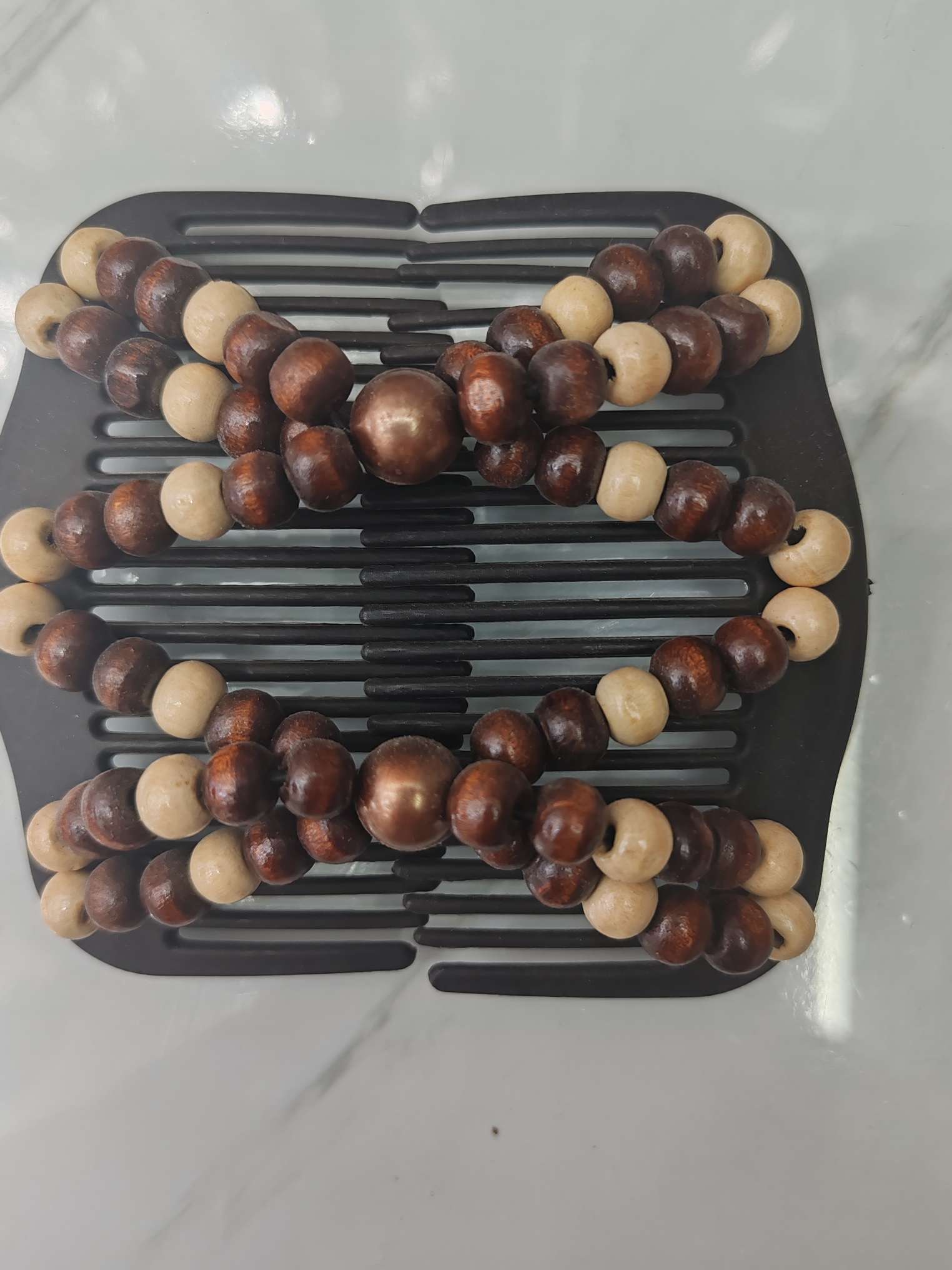 yy一25一8流行时尚手工木头百变发梳，600一件