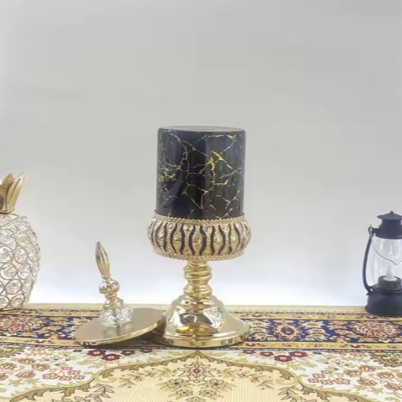 Decorative black glass storage jar with perforated metal base and gold lid luxury candy jar, perfect for home or office Application Scenario