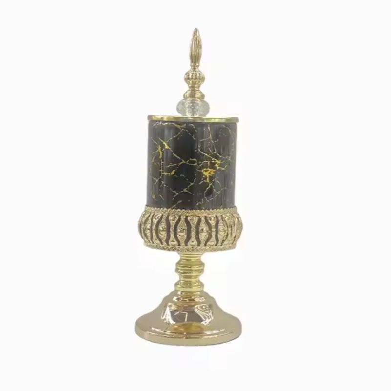 Decorative black glass storage jar with perforated metal base and gold lid luxury candy jar, perfect for home or office details Picture