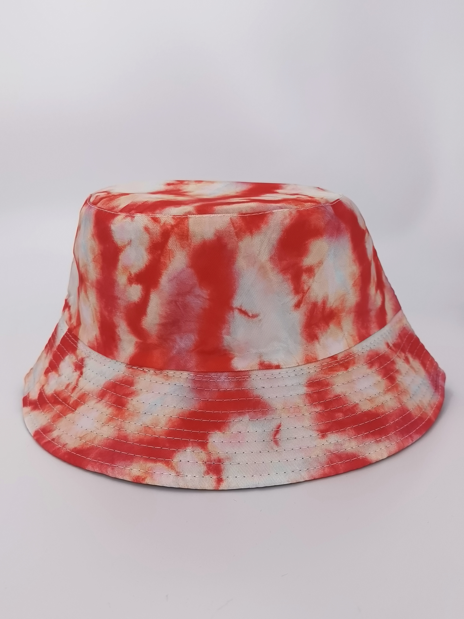 In spring and summer, tie-dye graffiti style is popular in Europe and America. It's fashionable and versatile for both men and women. Wear a fisherman's hat on both sides. It's a cool and portable hat for outdoor sun protection and shade Application Scenario