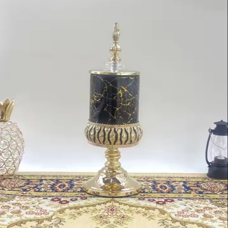 Decorative black glass storage jar with perforated metal base and gold lid luxury candy jar, perfect for home or office Item Picture