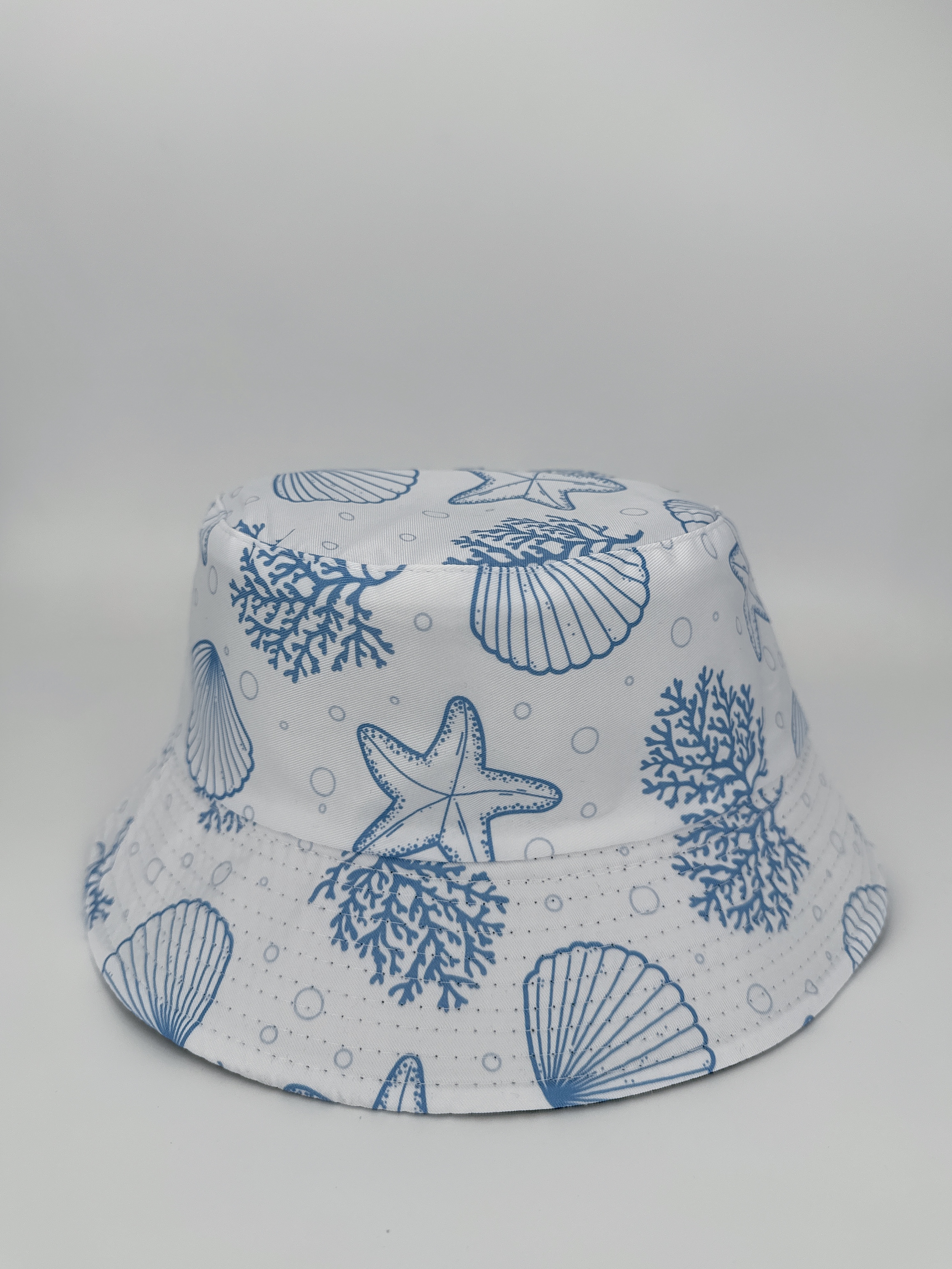 This is a fashionable and versatile fisherman's hat for both men and women in spring and summer. It can be worn on both sides and is suitable for outdoor sun protection and shade. It is a cool and portable hat full figure