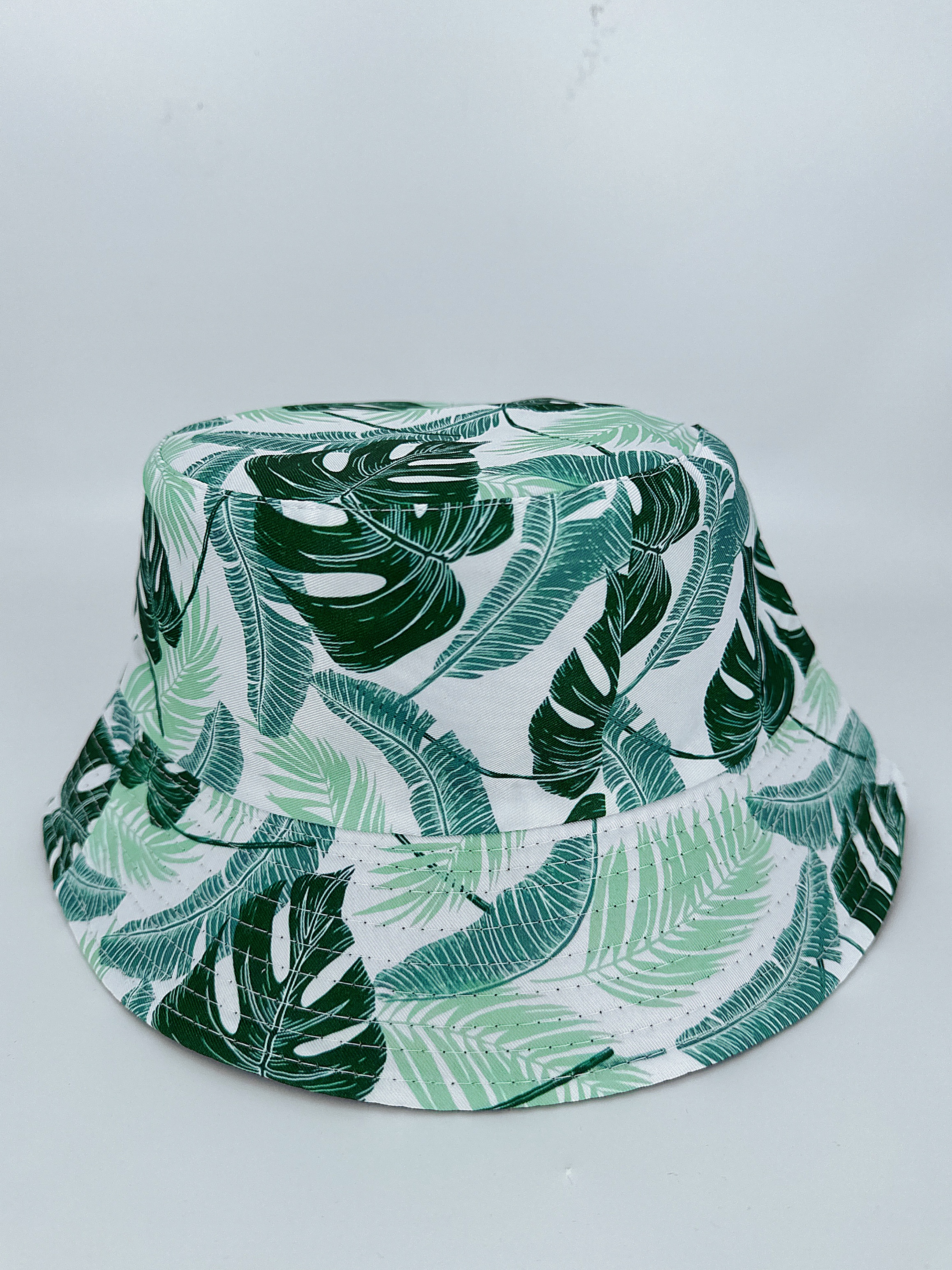 Spring and summer European and American seaside vacation style, leaf gradient graffiti, double-sided fisherman's hat, unisex, fashionable and versatile, outdoor sun protection, cool and portable hat, adult style Specification drawing