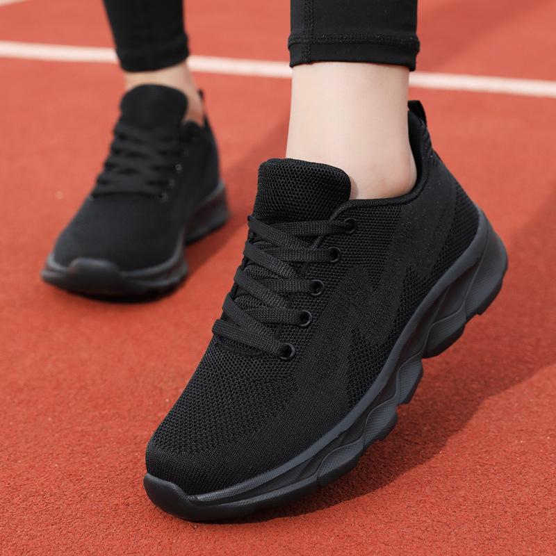 202 cross-border season new fly-knit sneakers women's black soft end casual running shoes women's breathable mesh travel shoes Application Scenario