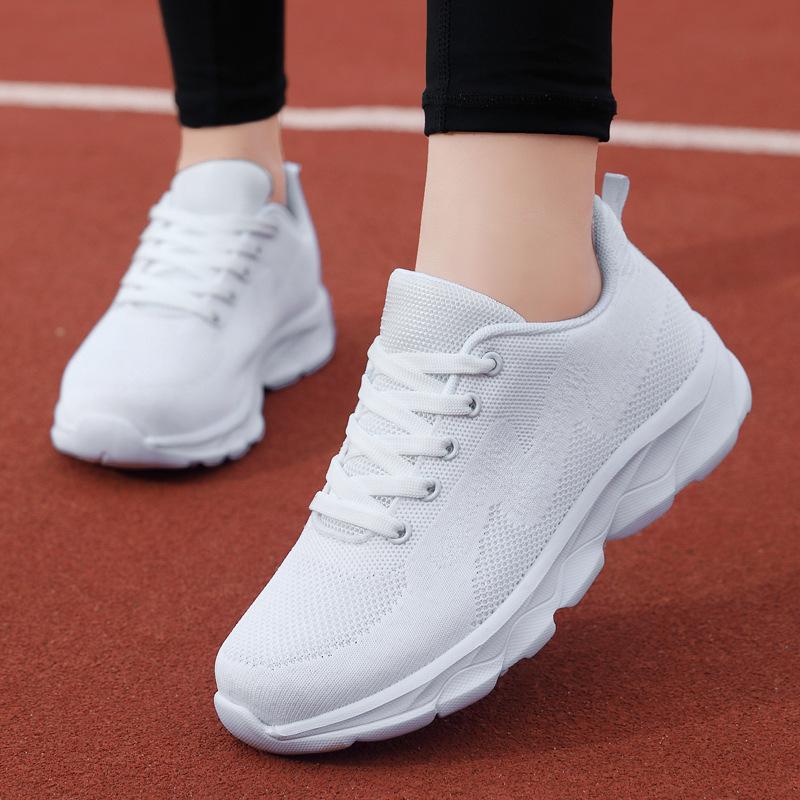 202 cross-border season new fly-knit sneakers women's black soft end casual running shoes women's breathable mesh travel shoes Item Picture