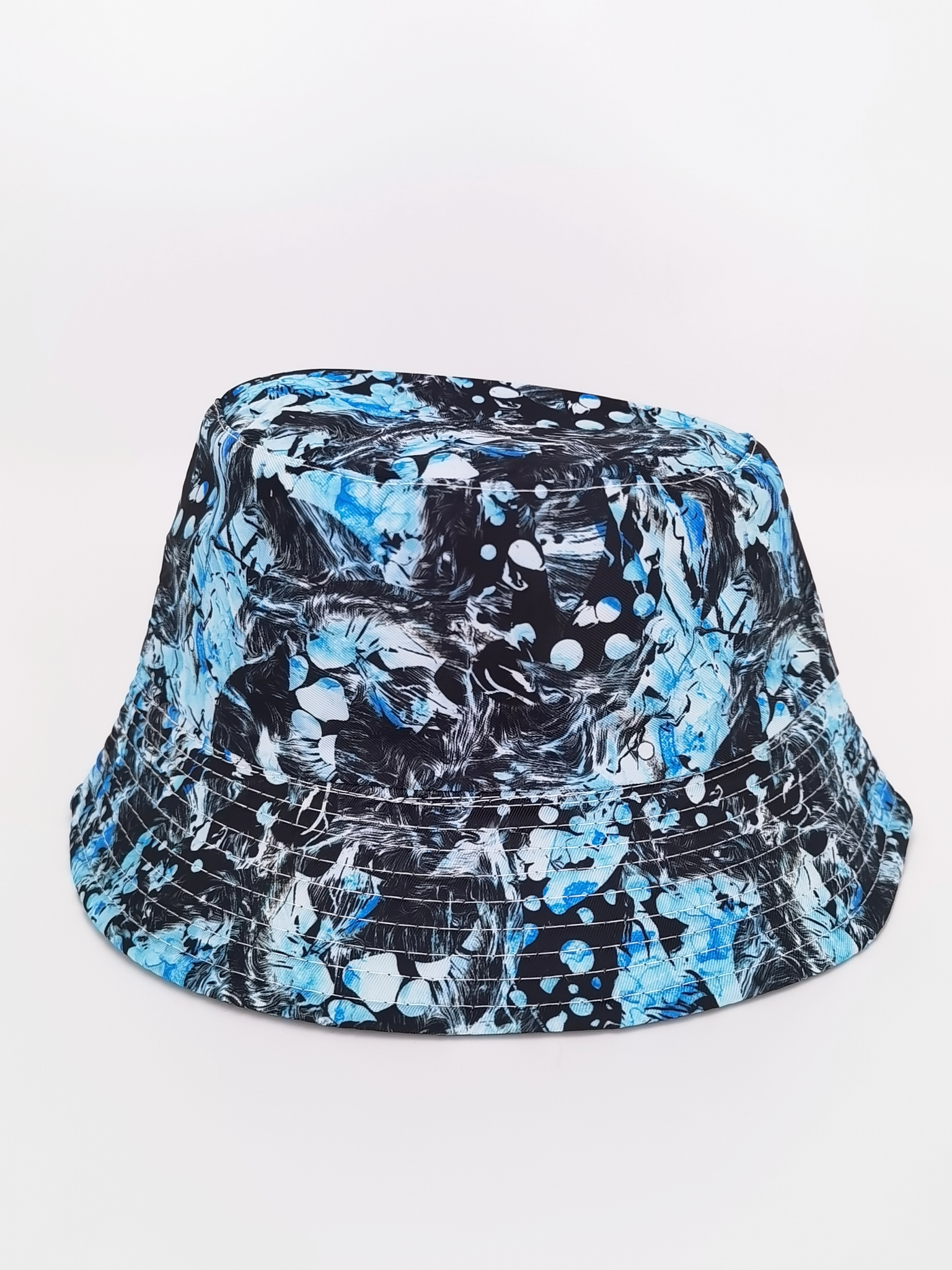 Spring and summer cross-border bestseller graffiti double-sided fisherman hat for both men and women, fashionable and versatile, outdoor sun protection, cool and portable hat, adult style Application Scenario