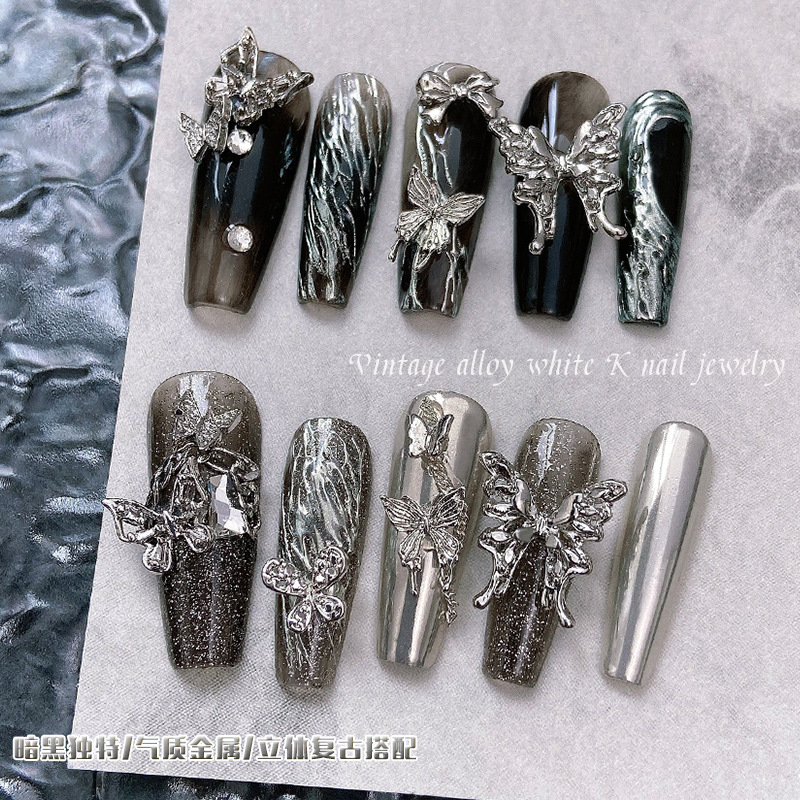 Factory direct sales of silver butterfly nail art accessories, light luxury three-dimensional bow, large metal butterfly wings, nail diamond jewelry, Internet celebrity bestsellers