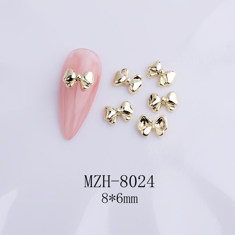 Factory direct sales of nail art bow accessories, alloy three-dimensional nail drills, small butterfly ribbon nail accessories, wearable nails, Japanese nail drills Item Picture