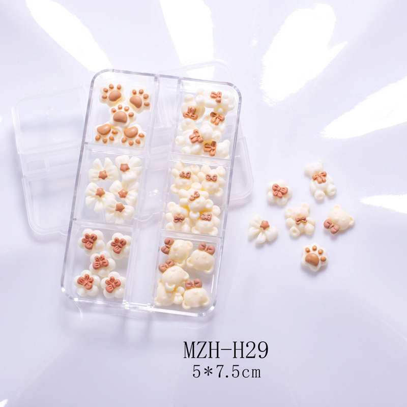 Factory direct sales, popular and trendy nail art butterfly accessories, long box set, crooked heart cartoon bear nail art accessories, mixed set, flat diamond Christmas bow Specification image