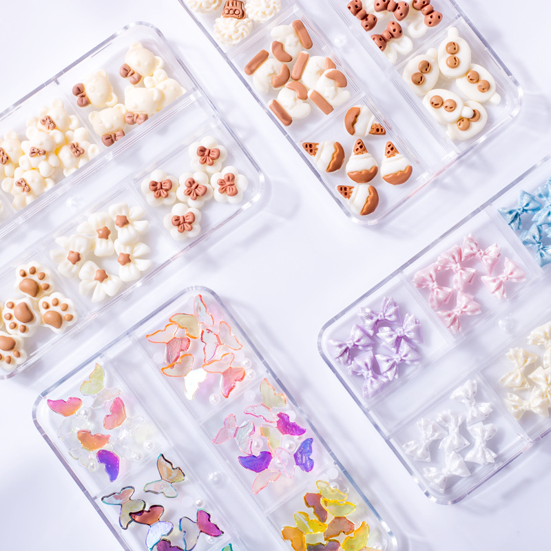 Factory direct sales, popular and trendy nail art butterfly accessories, long box set, crooked heart cartoon bear nail art accessories, mixed set, flat diamond Christmas bow