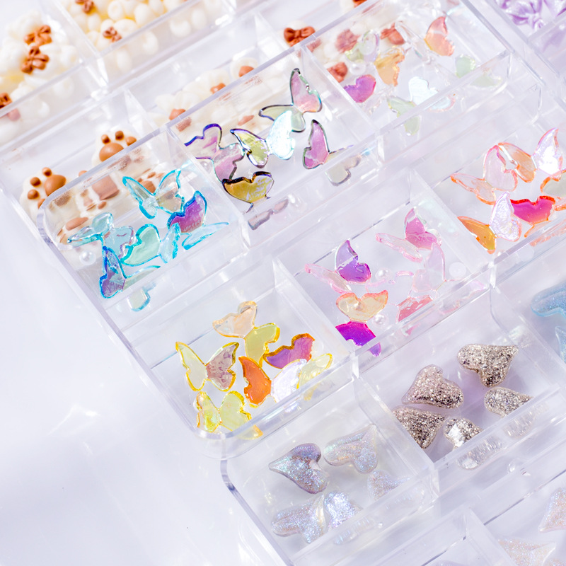 Factory direct sales, popular and trendy nail art butterfly accessories, long box set, crooked heart cartoon bear nail art accessories, mixed set, flat diamond Christmas bow details Picture