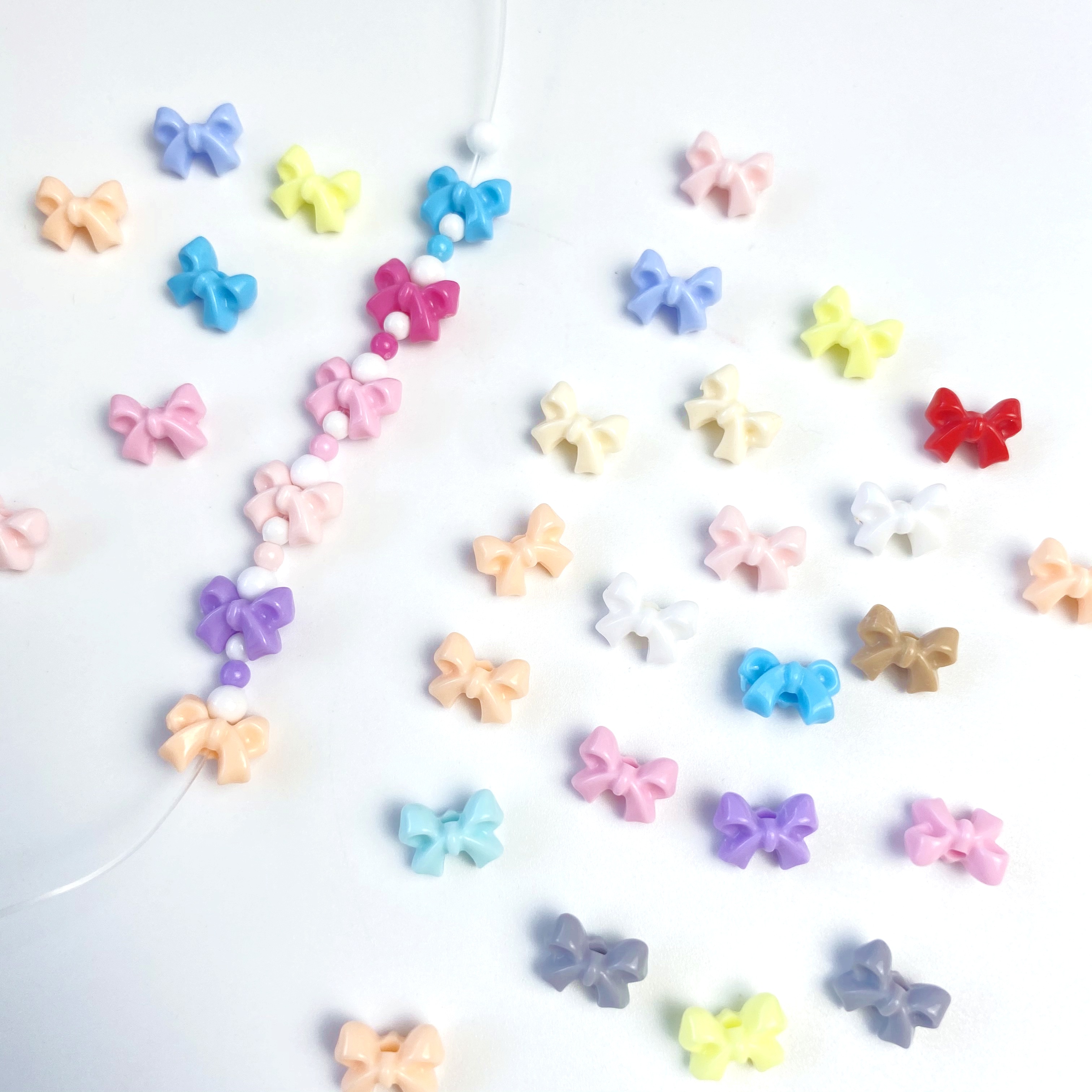 diy acrylic 10mm small bow/Mobile phone chain, key chain, bag, hanging piece, handcrafted jewelry, mixed color scattered beads raw materials Item Picture