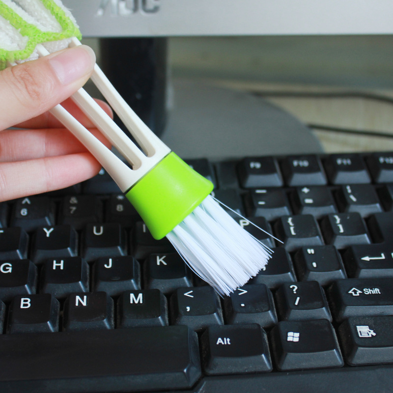 Weihaisheng Automotive Products' multi-functional dual-head cleaning brush, air conditioning outlet cleaning brush, car interior cleaning brush, keyboard brush Application Scenario