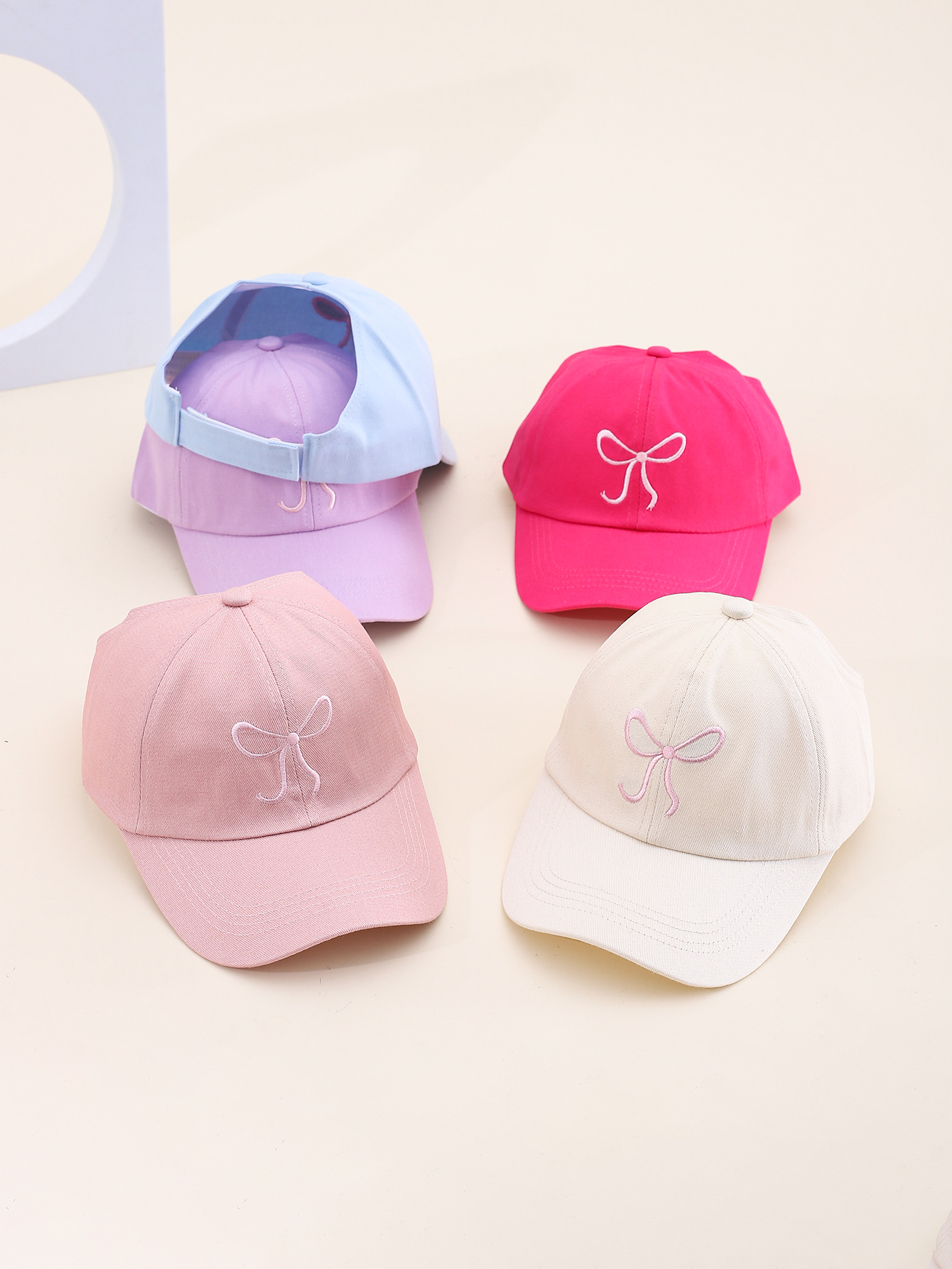 Spring and summer Korean-style embroidered bow duck tongue baseball caps can be tied into high ponytails. Outdoor sun protection open-top sunshade hats. Adjustable for both adults and children full figure