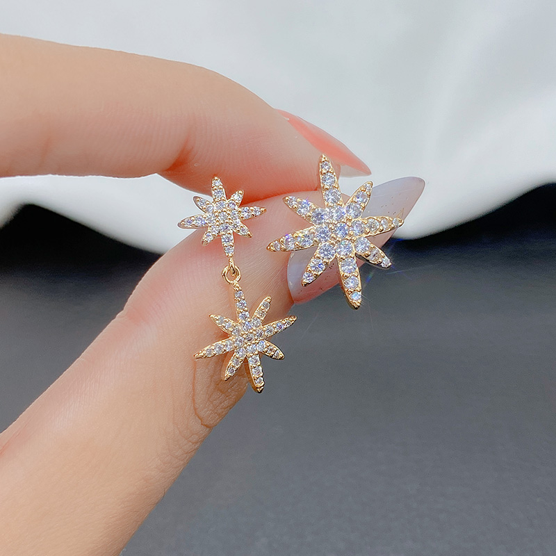 Xuhui brand exquisite and light luxury copper plated with real gold and zircon inlaid 925 silver needle star AB style luxurious design fashionable stud earrings details Picture