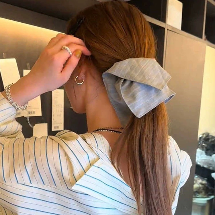 The same striped large intestine hair band for women, a high-end and gentle style bun hair accessory for the back of the head details Picture
