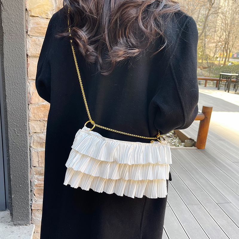 2025 High-end women's crossbody bag, a new French retro pleated lace fashionable commuting single-shoulder handbag details Picture