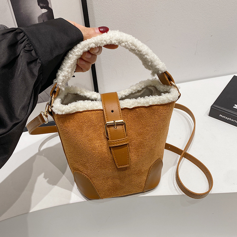 Spring 2025 new style Korean-style hand-held shoulder crossbody bag, bucket tote bag, solid color contrasting women's bag full figure