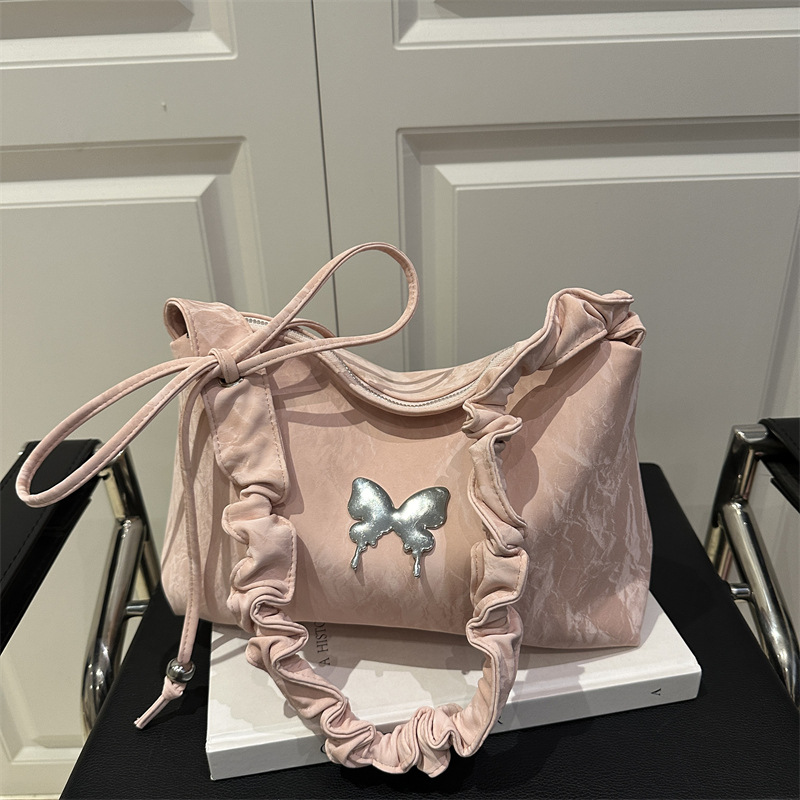 The 2025 new style of the pleated underarm bag for women is a fashionable and versatile small square bag with a high-end and stylish look. It is a single-shoulder crossbody bag full figure