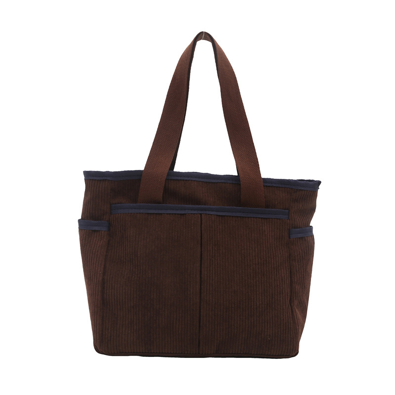 A niche design Japanese-style zipper commuter thickened canvas tote bag, a casual and artistic student simple single-shoulder handbag Item Picture