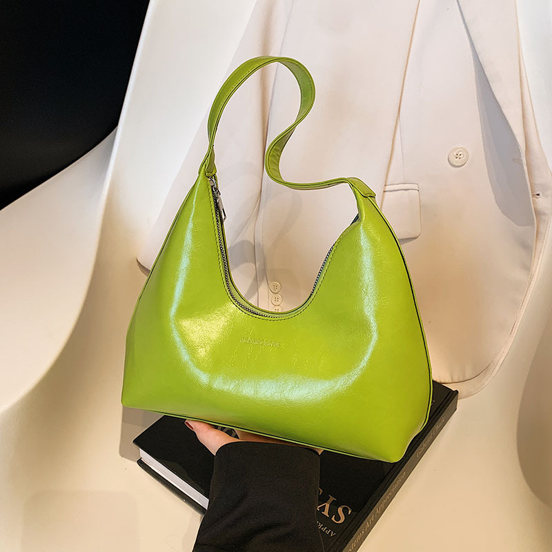 A high-quality and niche handbag for women in spring 2025, a versatile single-shoulder underarm bag and a fashionable hand-held dumpling bag full figure