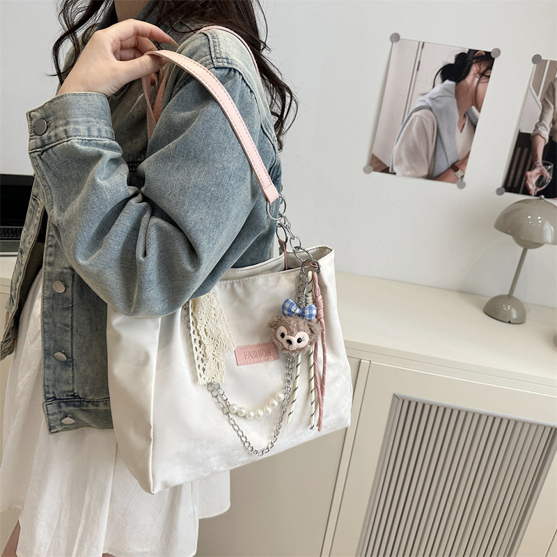 This is a new spring large-capacity tote bag for students' commuting to school, featuring a unique and elegant single-shoulder design for women Specification drawing