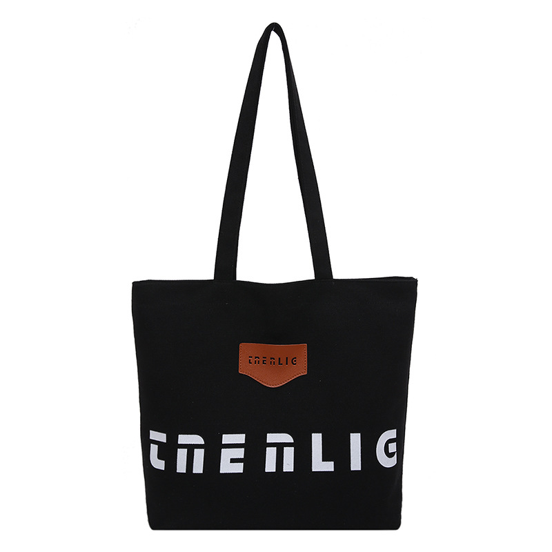 A large-capacity canvas bag for women's spring, a new 2025 casual single-shoulder tote bag for college students' commuting to class Item Picture