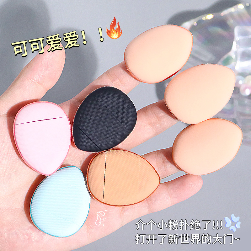 Thumb powder puff, fingertip cushion, loose powder, setting, concealing, finger pad details, mini mini slipper powder puff Application Scenario