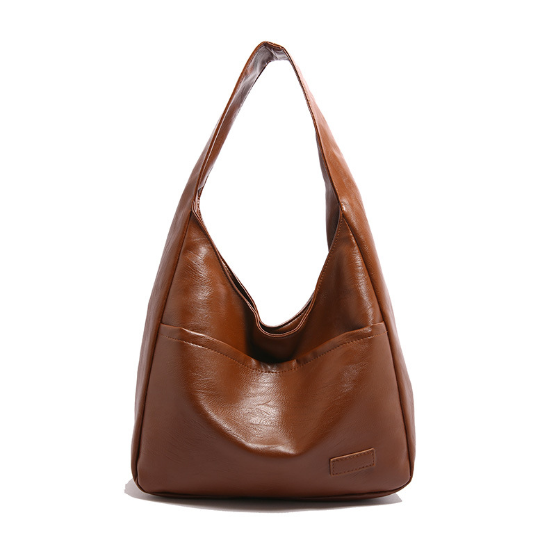 Large-capacity female 2024 new autumn and winter soft leather bucket bag, commuter tote bag, college student class single-shoulder bag Item Picture