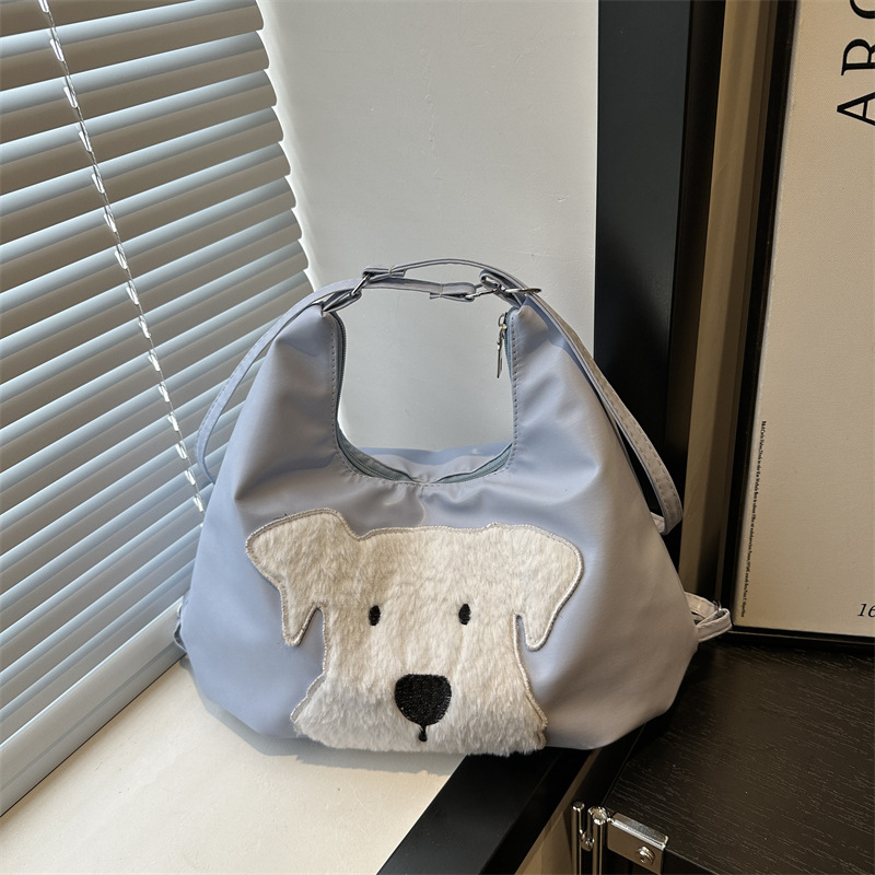 The new autumn and winter 2024 fashion cartoon backpack with simple, individual and niche design, single-shoulder bag and commuter tote bag full figure